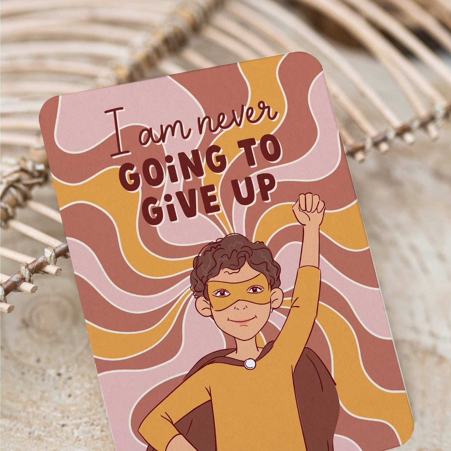 Kids affirmation Card with a colorful design featuring a person raising a fist and the text 'I am never going to give up'.
