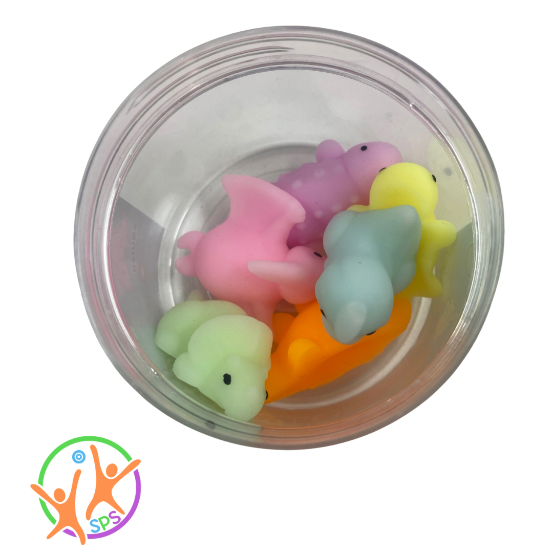 Birds Eye view of squishy Squeeze dinosaurs in tub
