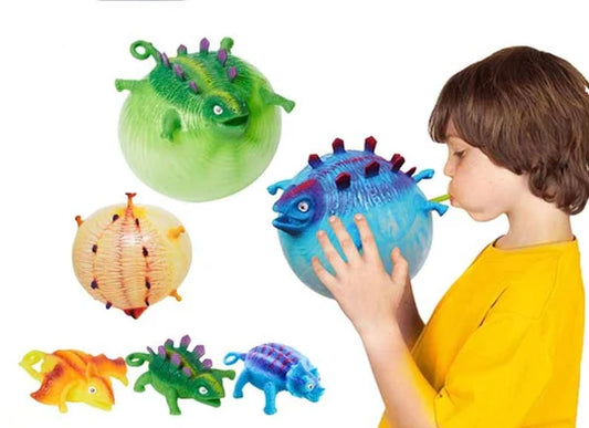 boy inflating a balloon toy