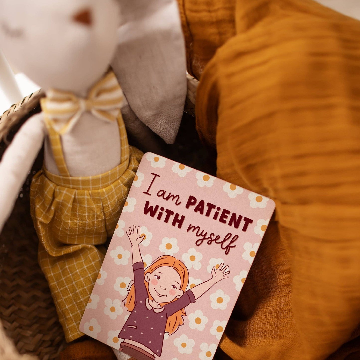 kids Affirmation card 'I am patient with myself' with a plush toy in the background