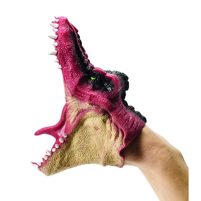 A vibrant pink and tan Spinosaurus Super Stretchy Dino Hand Puppet being stretched wide to show its flexible mouth.