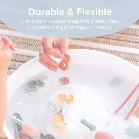 Children's hands interacting with colorful silicone numbers in a play tray, with text highlighting durability.