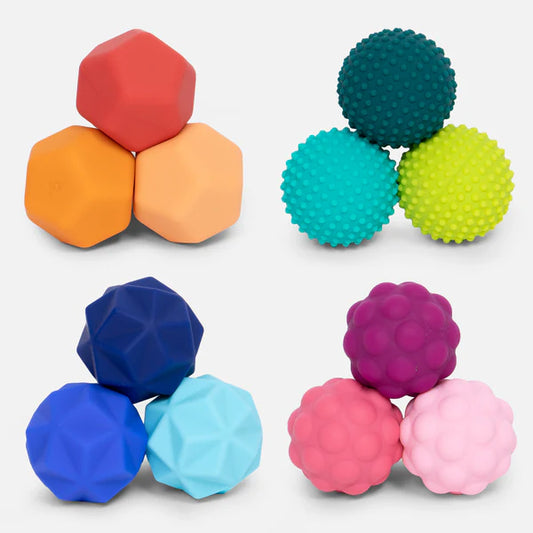 Speks Odds are Colorful silicone textured balls stacked as triangles on a white background