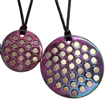 two round, pendants rainstorm and hailstorm in oil slick with metallic pins.