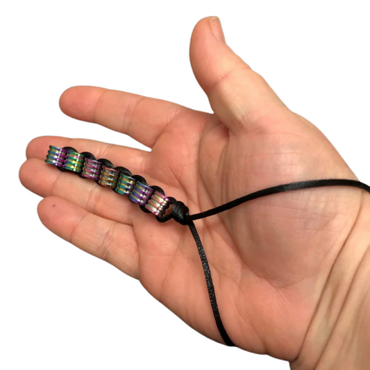 Hand holding the silkworm Kaiko Fidget