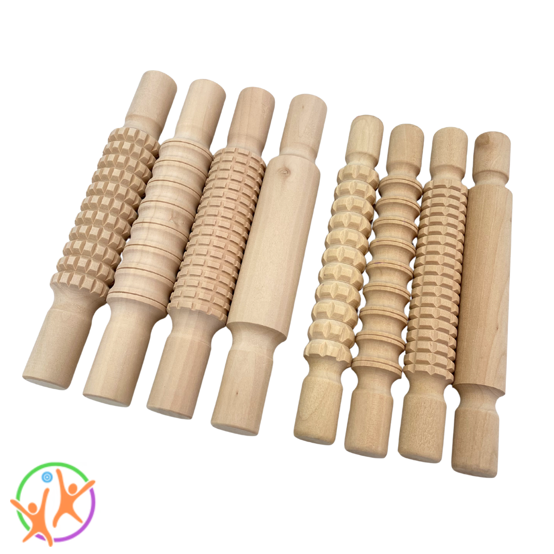 One set of small rolling pins and one set of large rolling pins next to each other