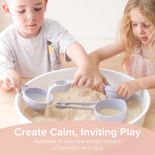 a young boy and girl scooping sand in a Sensory Play Tray with scoop, funnel and bowl