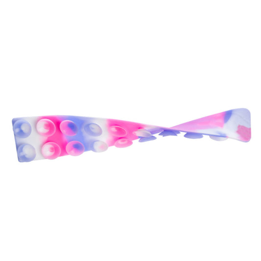 A multicoloured pink, purple and white tentacle pop twisted to show both sides