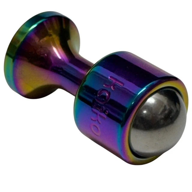 Multicolored dumbbell-shaped detonator fidget showing the ball end