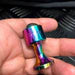 palm sized metal fidget held in hand