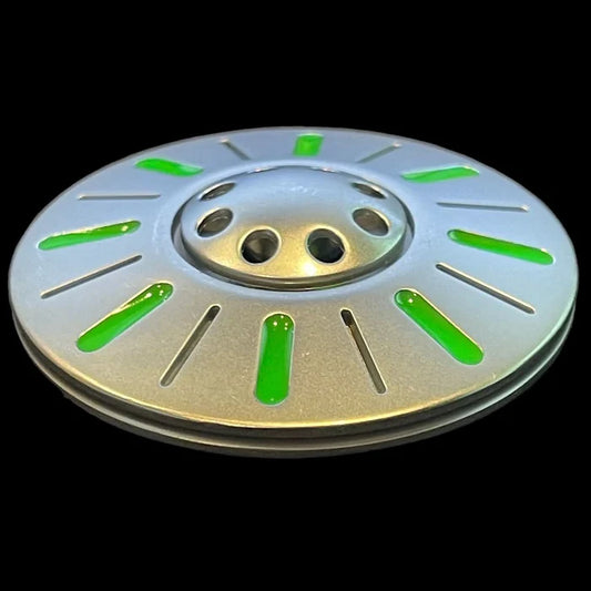 UFO Spinner is a Metallic disc with green accents on a black background