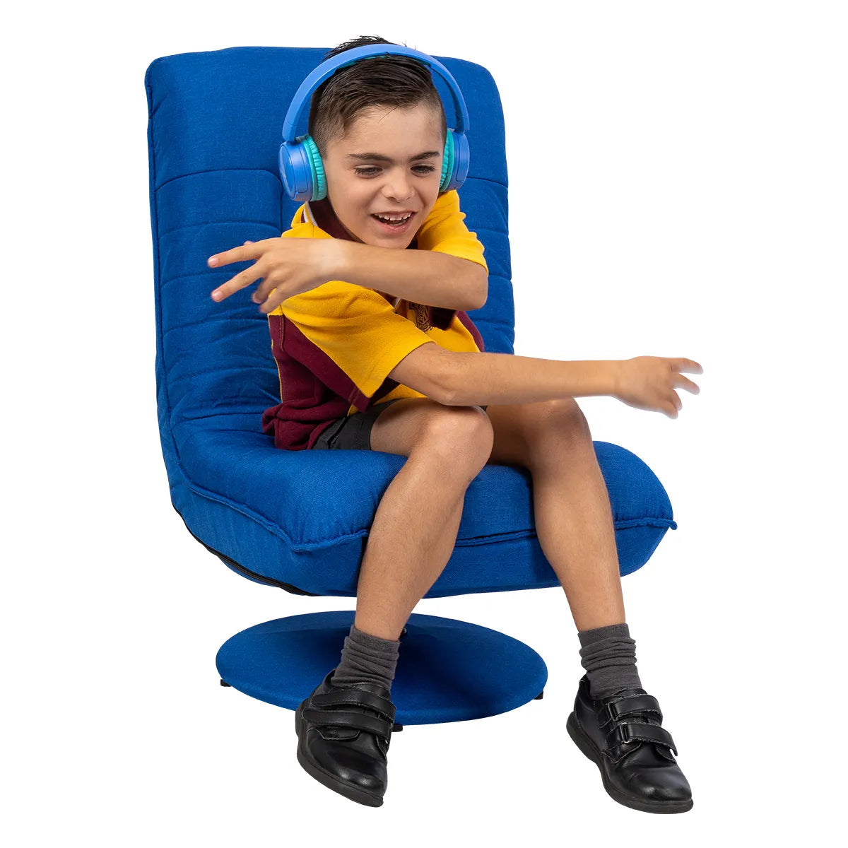Boy student wearing earmuffs sitting on swivel floor chair.