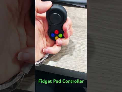 Fidget pad controller in use