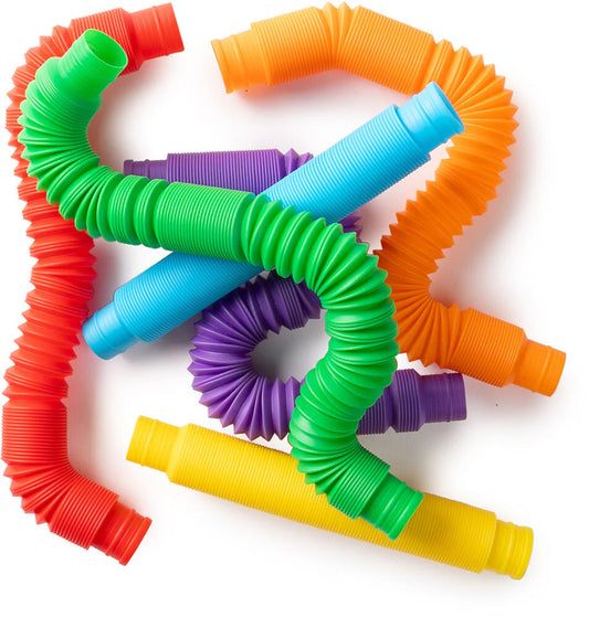 Colorful plastic pop tubes pulled into various shapes