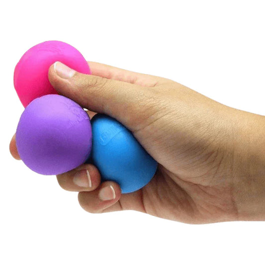 Nee doh groovy globs of 3 x squishy balls held in one hand