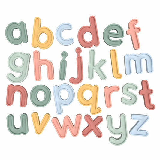 Silicone alphabet letter set layed out on a white background