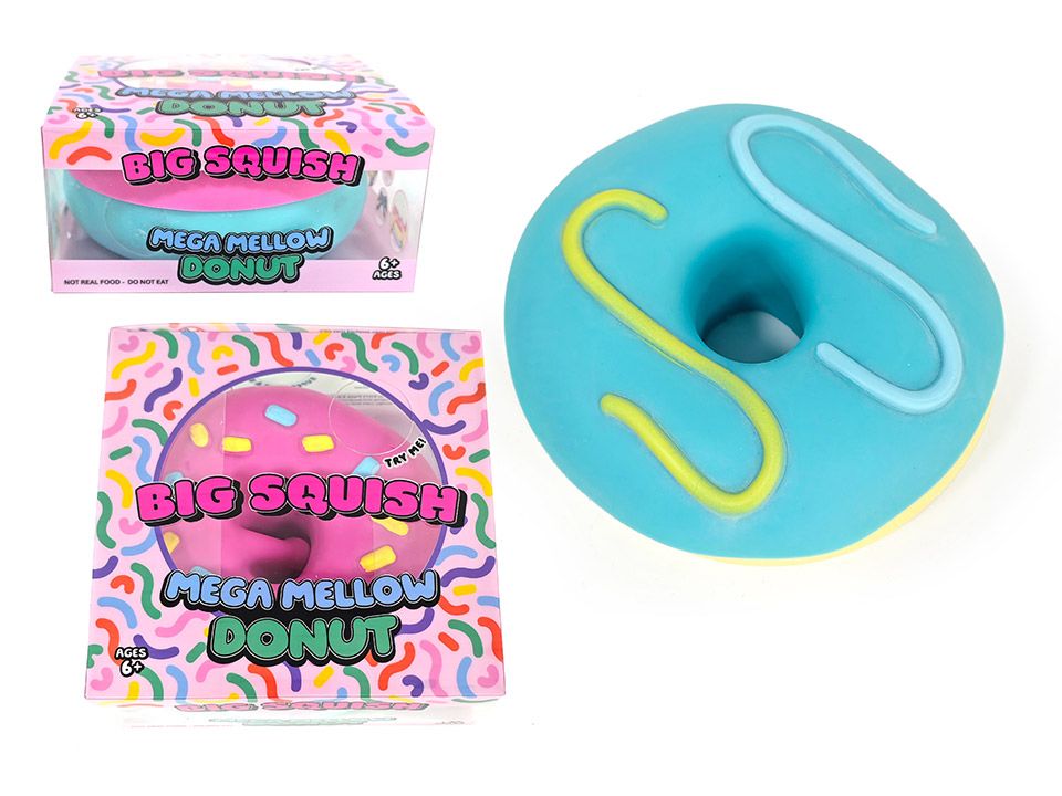 A donut-shaped big squishy toy shown next to its retail packaging. The toy is light blue with yellow and light blue icing details, while the packaging features a colourful sprinkle pattern and text reading 'BIG SQUISH MEGA MELLOW DONUT'.