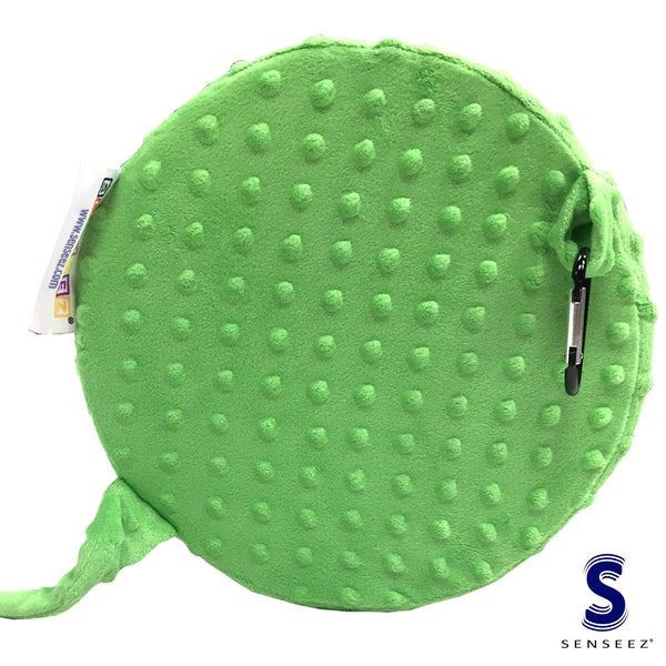 Green textured bumpy turtle round vibrating cushion with a zipper on a white background, featuring the Senseez brand.