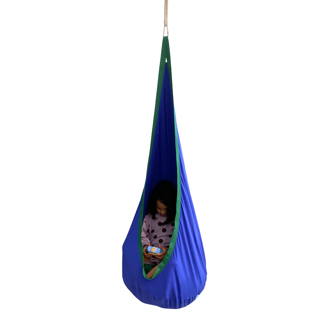 Blue pod swing with child sitting inside playing a game