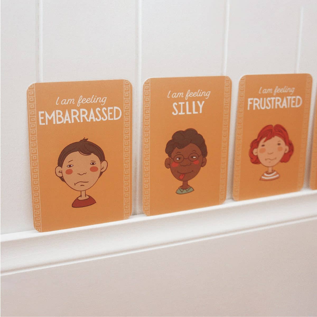 Three emotions cards in yellow zone 'Embarrassed', 'Silly', and 'Frustrated'
