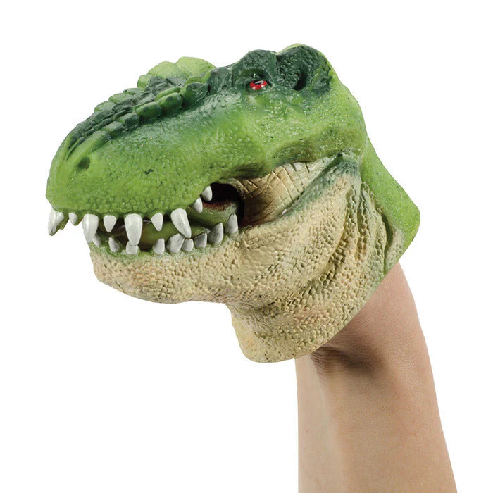 A green Tyrannosaurus Rex Super Stretchy Dino Hand Puppet shown on a person's hand against a white background.