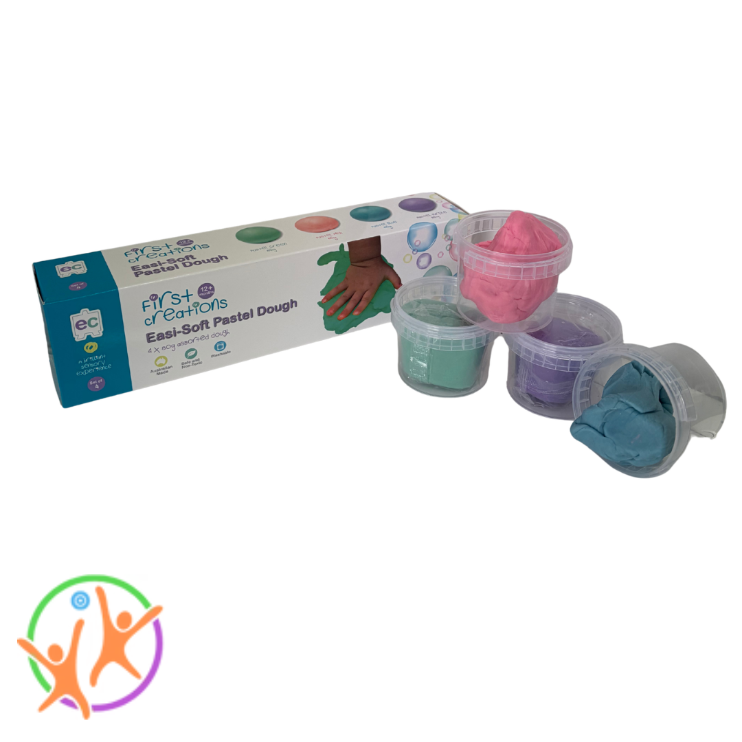 Pastel colored dough in containers with packaging on a white background