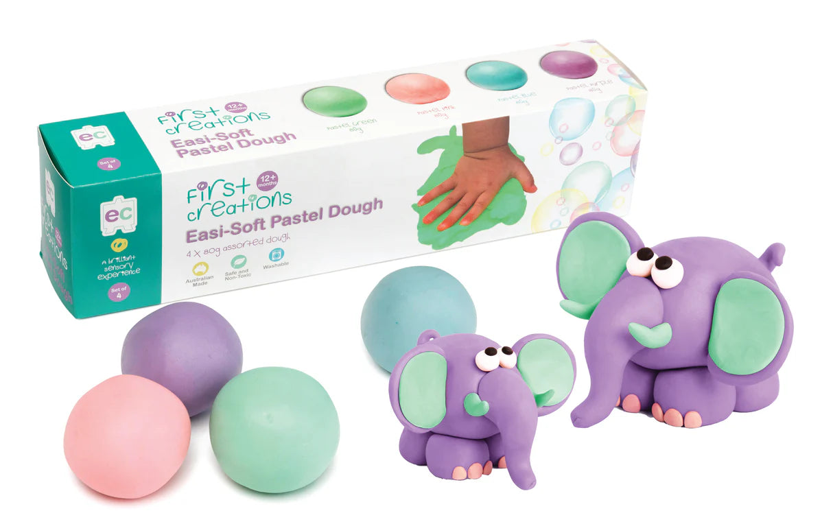 Set of pastel dough with elephants made from dough with packaging on a white background