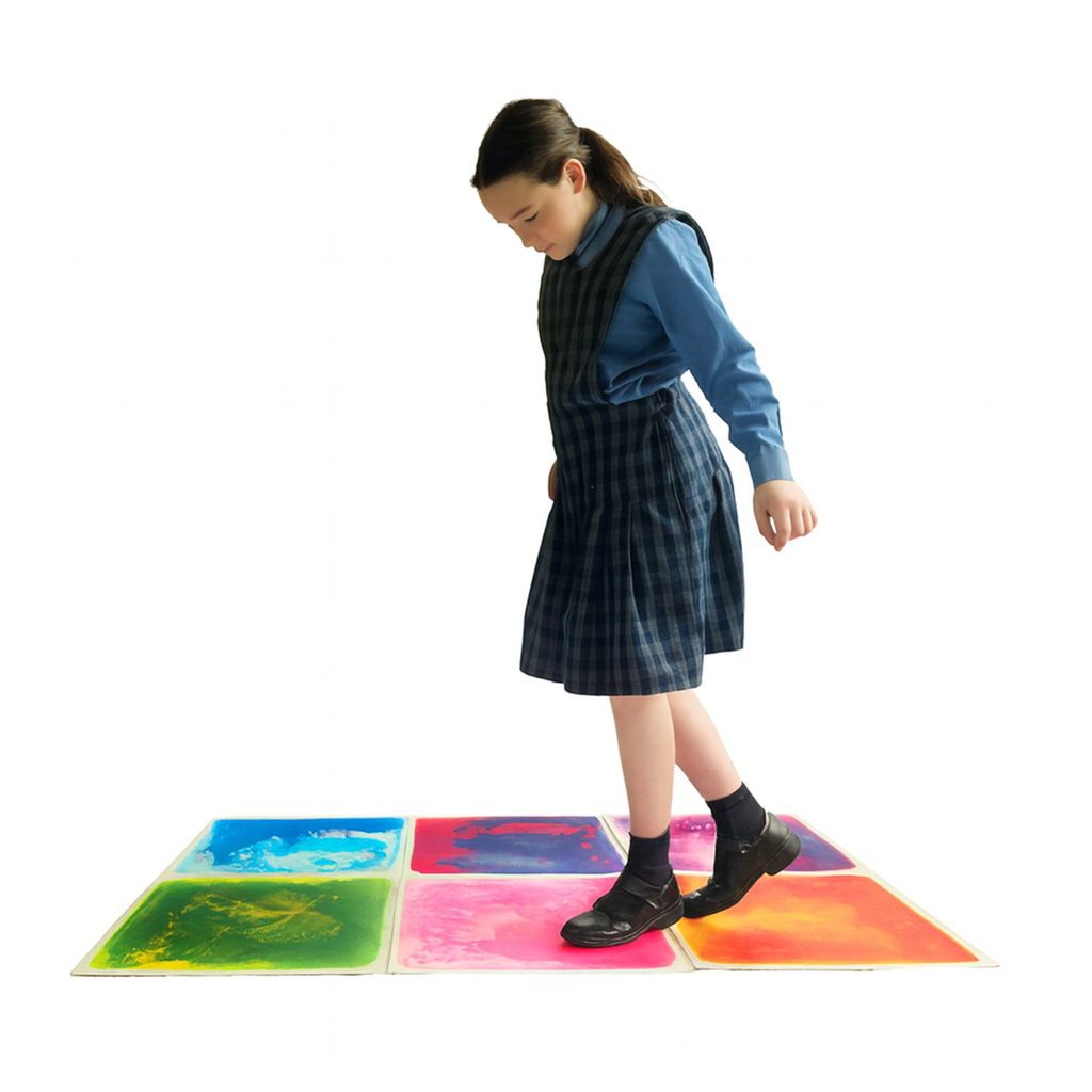 school student stepping on colourful sensory liquid floor tiles laid 2 by 3 with a white background