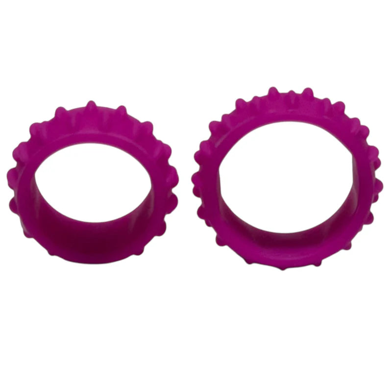 Two fuchsia silicone rings on a white background