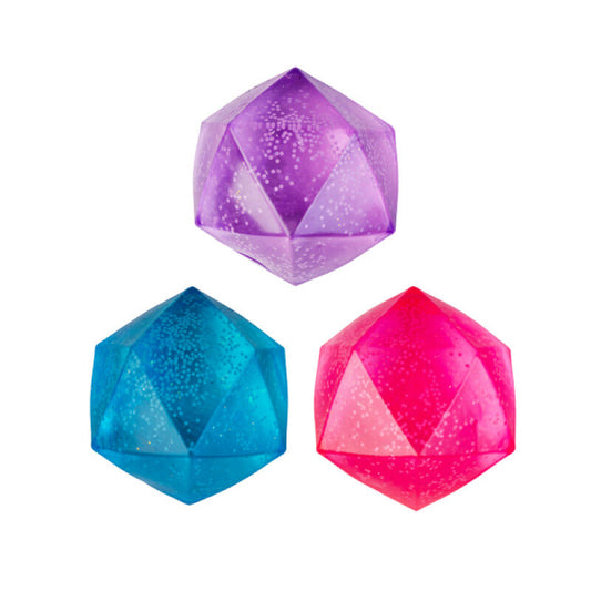 Three polyhedral stress balls in purple, blue, and pink on a white background