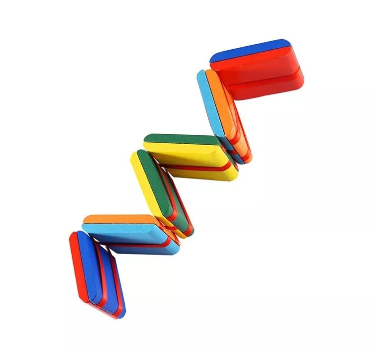 Multicoloured Jacobs Ladder toy on a white background