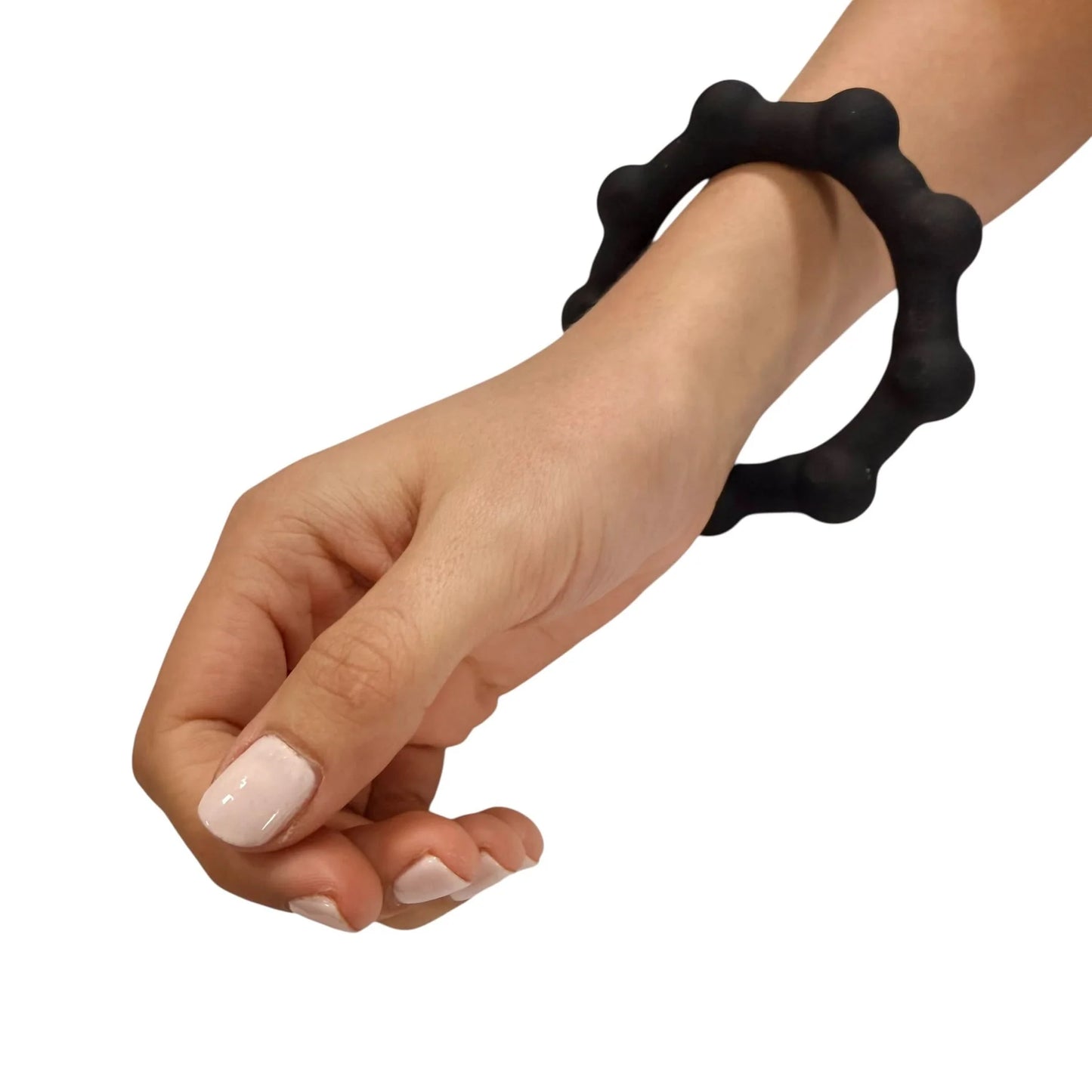 Black kaiko octopop bracelet on a wrist with a white background