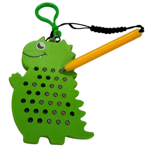 Kaiko dinosaur shaped magnetic pad keyring on a white background