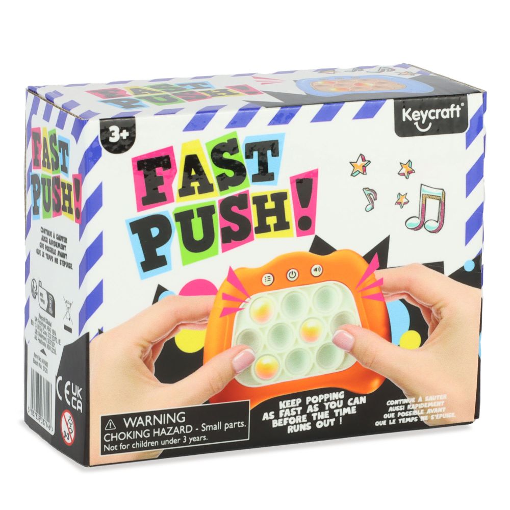 Box of 'Fast Push!' toy with colorful text and a hand holding the toy.