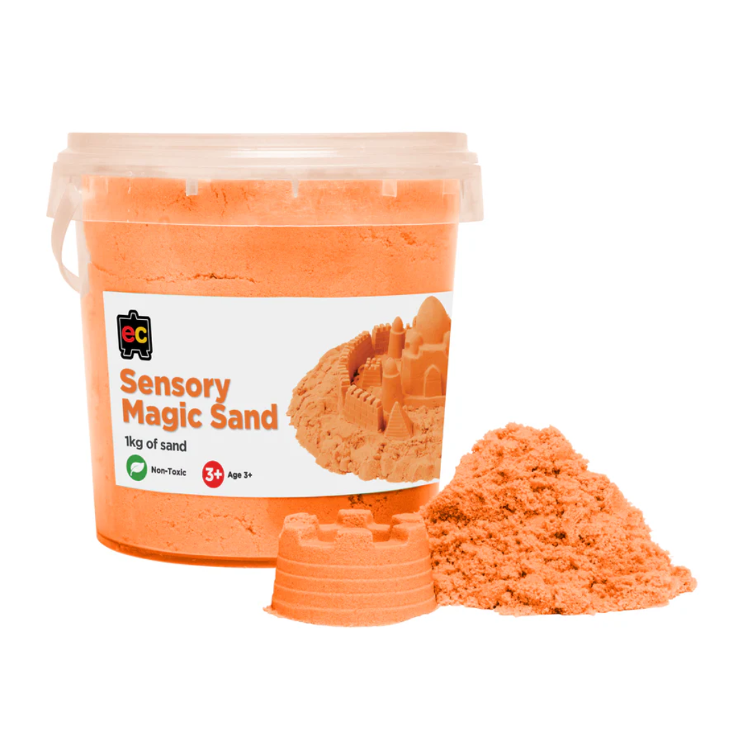 Orange sensory magic sand 1kg with a container and castle structures on a white background