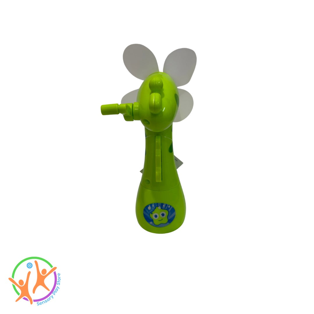 Back view of misting fan giraffe in green