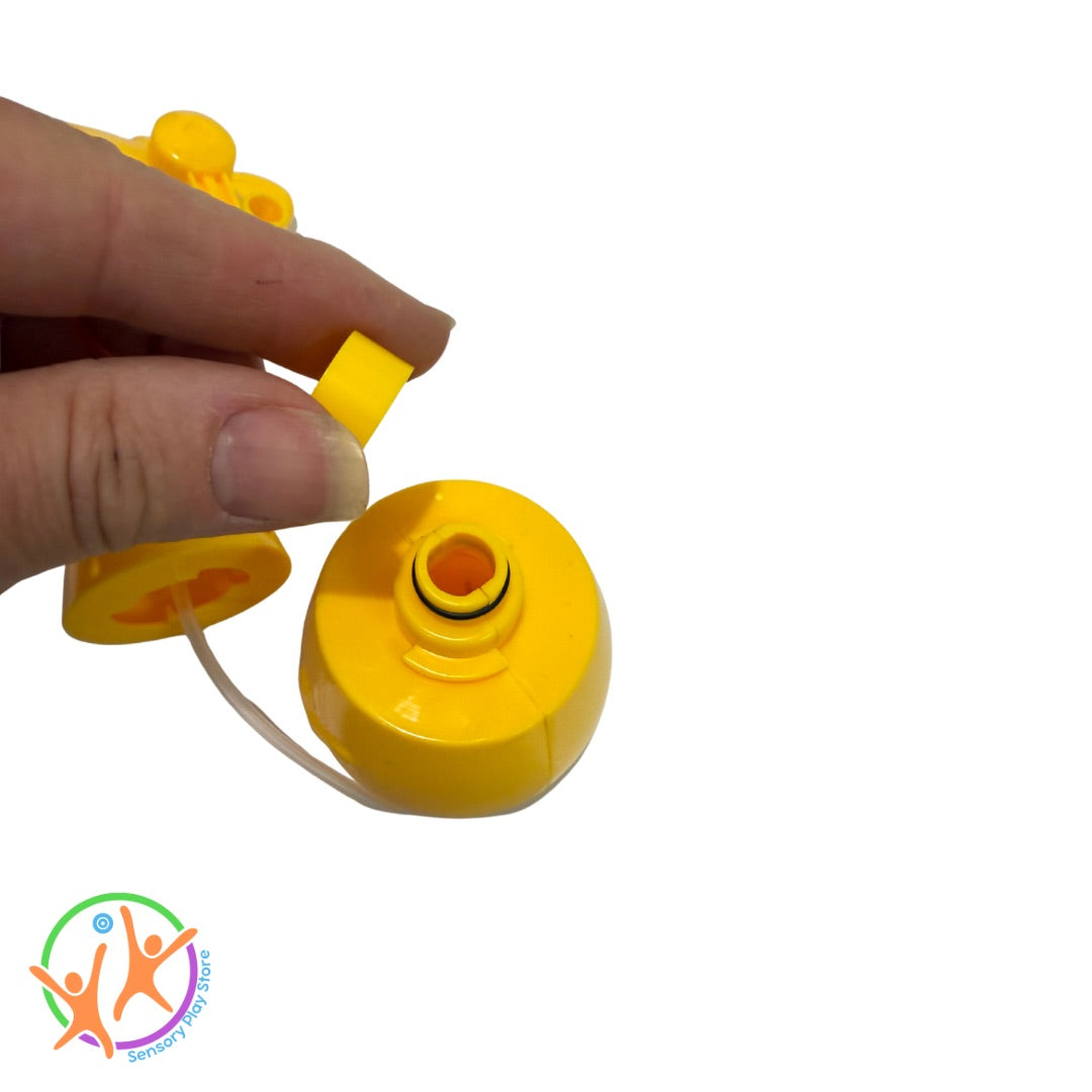 yellow water compartment of misting fan with fingers holding the lid