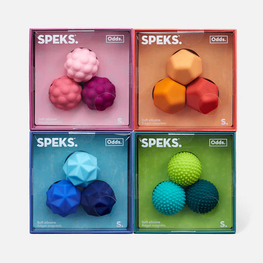 Speks Odds bundle contains Four boxes of SPEKS silicone magnet toys in different colors stacked 2 x 2