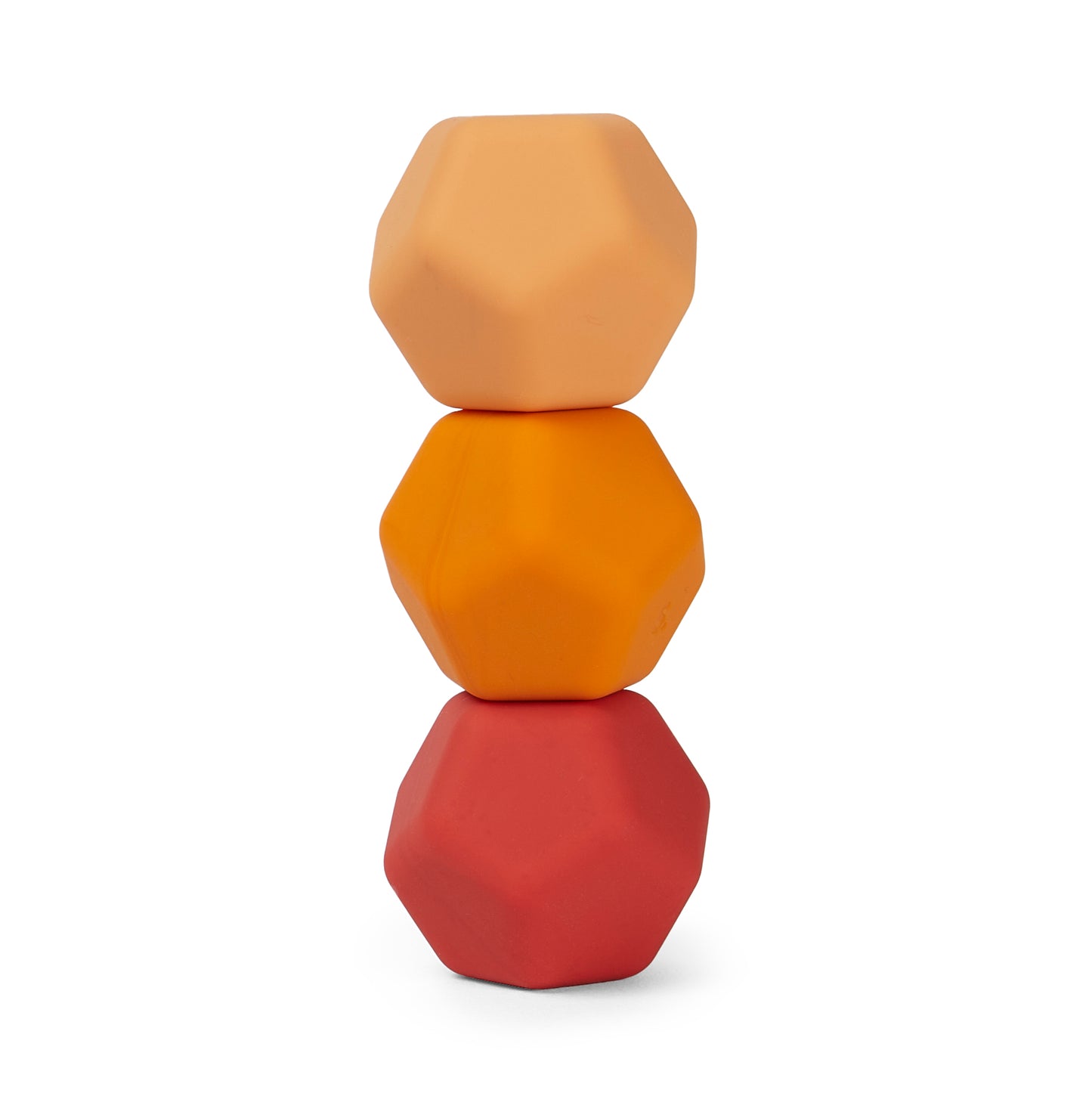 Stack of three speks odds orange plane geometrically shaped objects in peach, orange, and rose colours on a white background