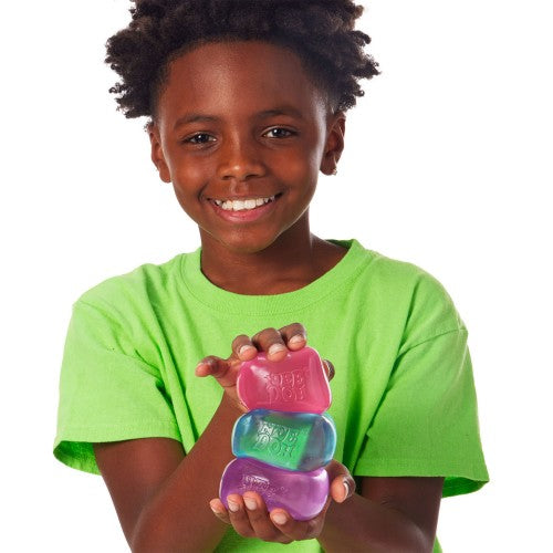 child holding a stack of 3 nice cubes