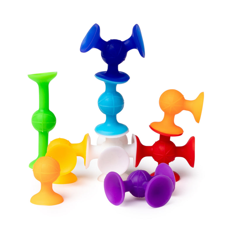 Colourful plastic Sensory Sprouts suction shape toys on a white background