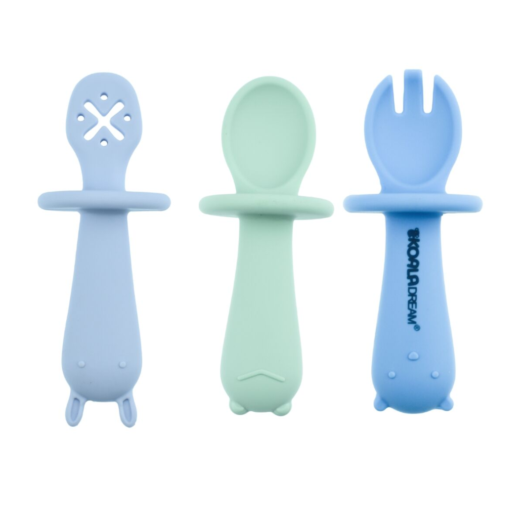 Three silicone utensils in light blue, green, and light blue on a white background