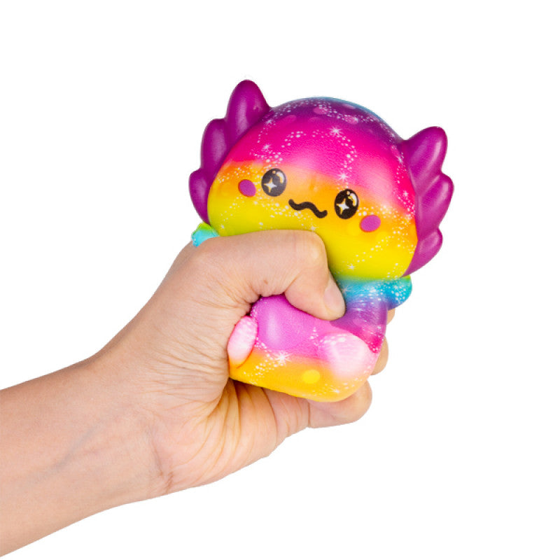 Smoosho's Slow Rising Axolotl being squeezed by a child's hand