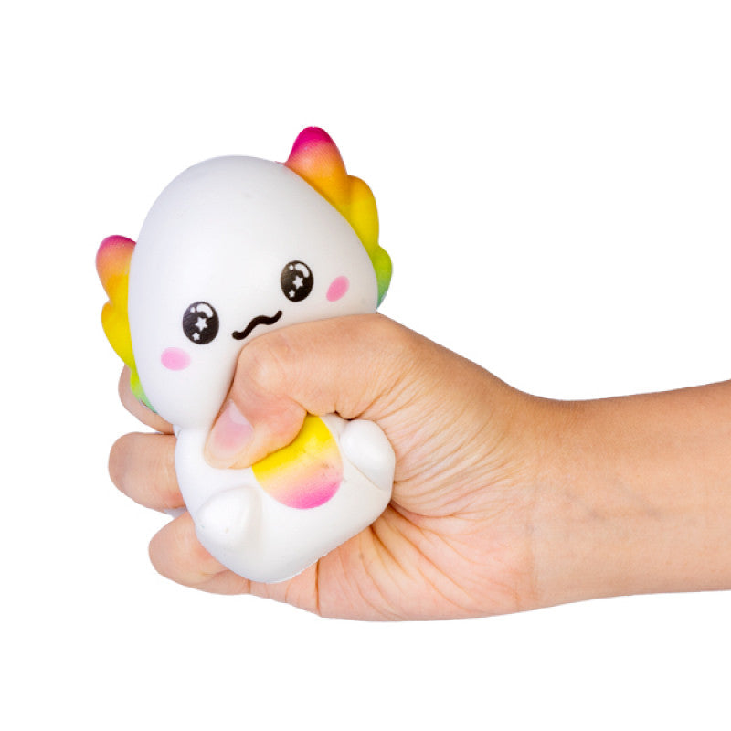 Smoosho's Slow Rising Axolotl being squeezed by a child's hand