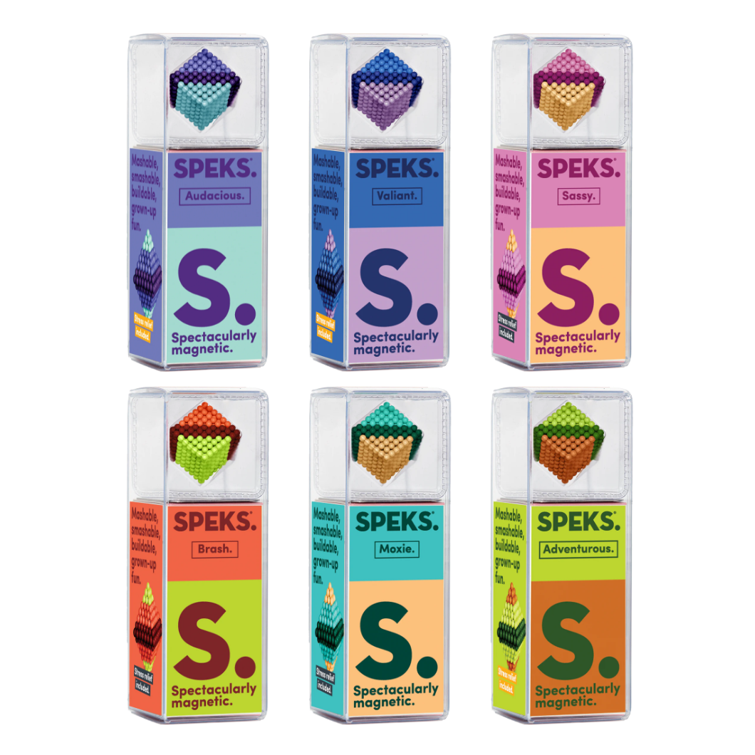 Six of the Speks Bold product boxes with colourful designs and text on a white background