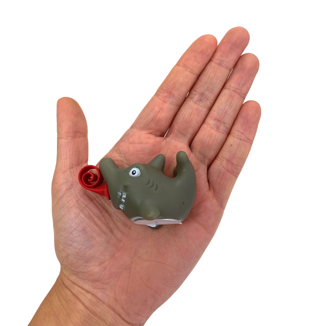 Shark Long Tongue Animal on the palm of a hand showing it's size on a white background