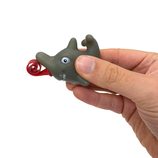Hand holding a shark long tongue animal on a white background