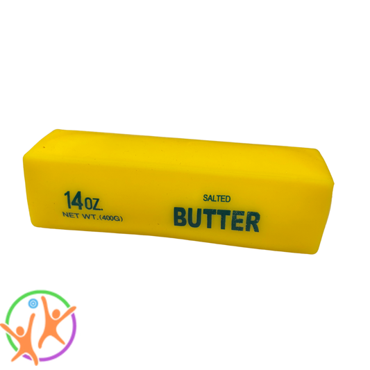 A yellow squishy butter block with printed text reading '14oz', 'NET WT.(400G)', 'SALTED', and 'BUTTER' in dark blue, shown on a plain white background.