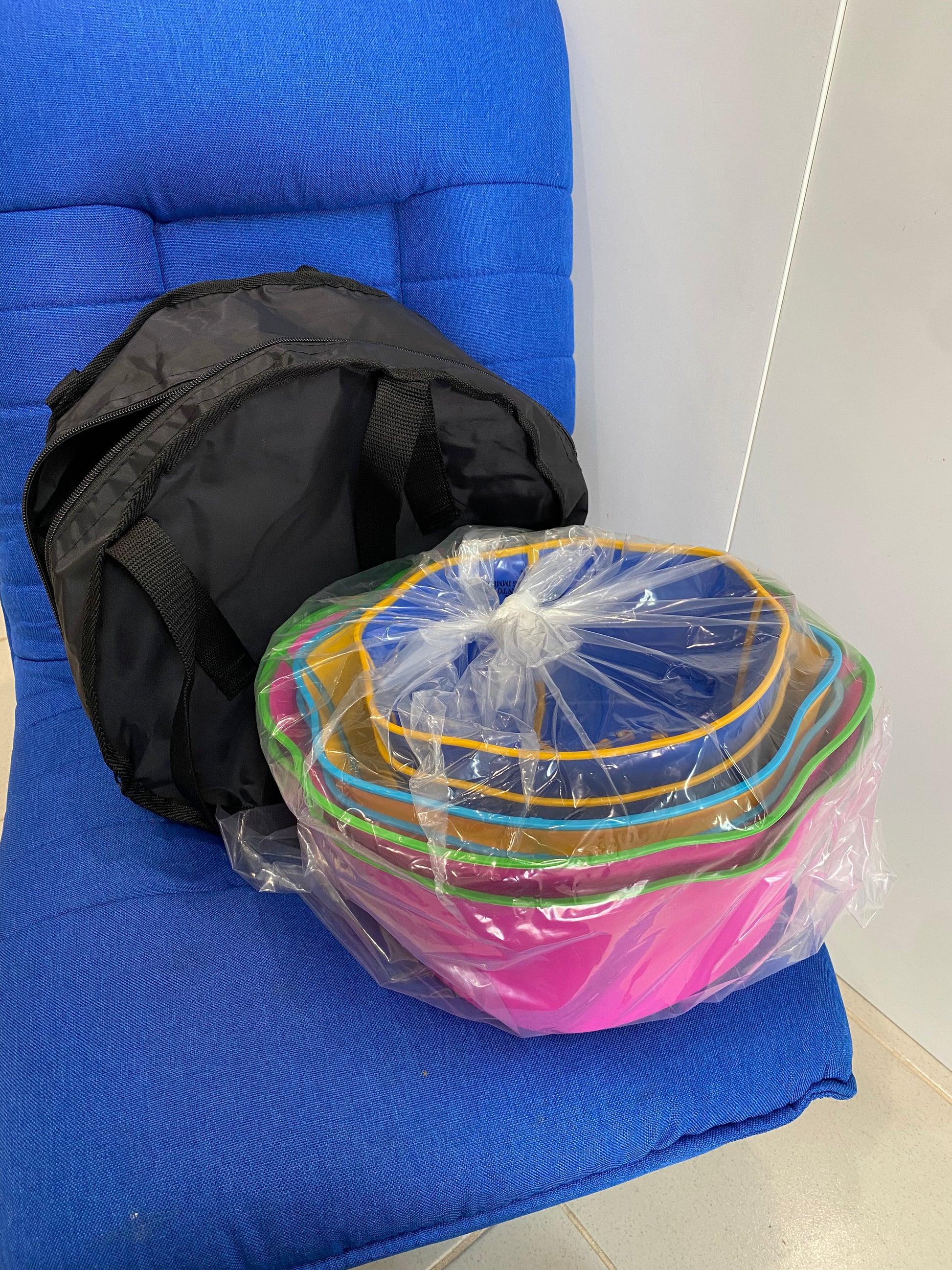 Step a Stumps and carry bag on a blue chair