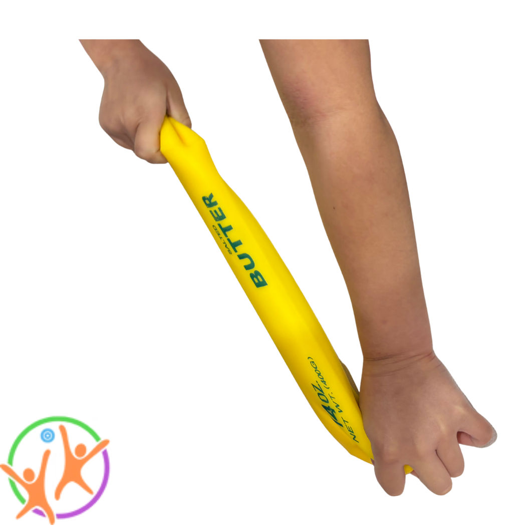 A yellow squshy butter being pulled and stretched by two hands